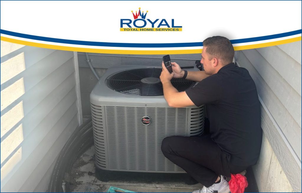 An HVAC tech fixing a heat pump